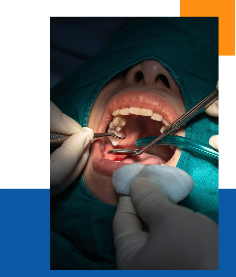 Stock image of a patient being treated using dental equipment